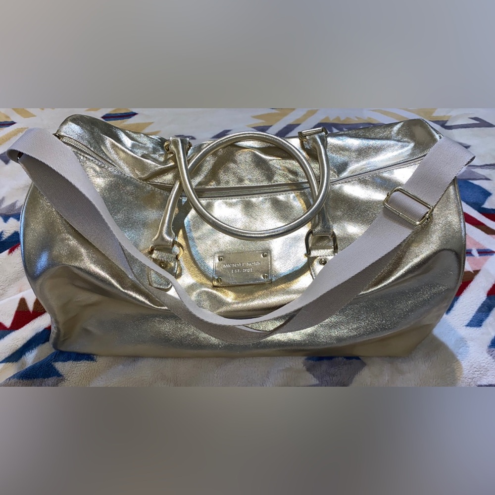 Large gold Michael Kors duffel bag